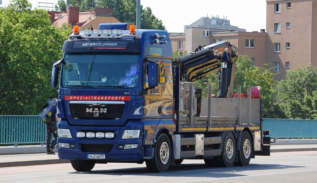 MAN TGX 26.440 Baustofftransporter (Selbstlader) der Fa. MEYERKOLDINGEN Spezialtransporte, 17.06.13 Berlin-Putlitzbr�cke.