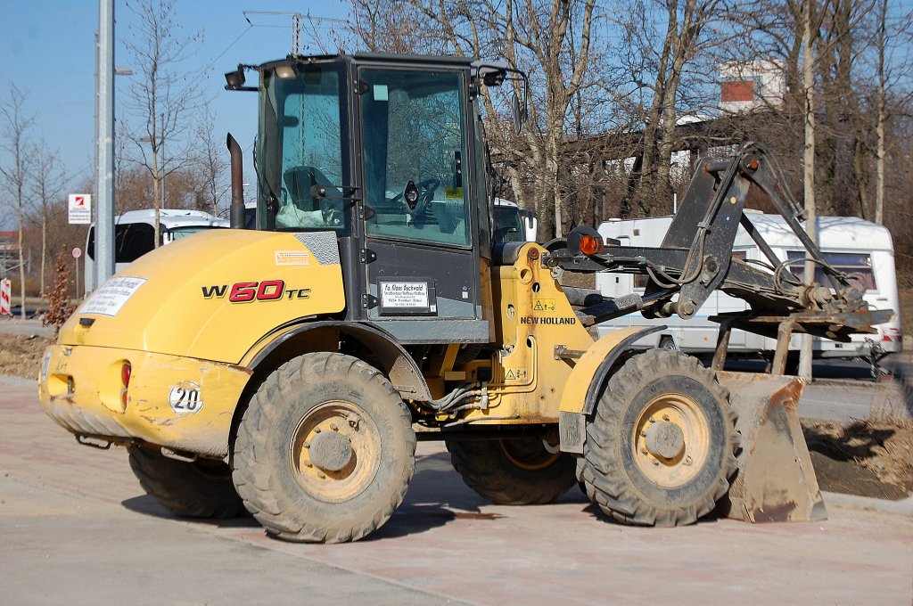 NEW HOLLAND W60TC Radlader der Fa. KLAUS BUCHWALD am 07.03.10 in Berlin-Lichtenberg