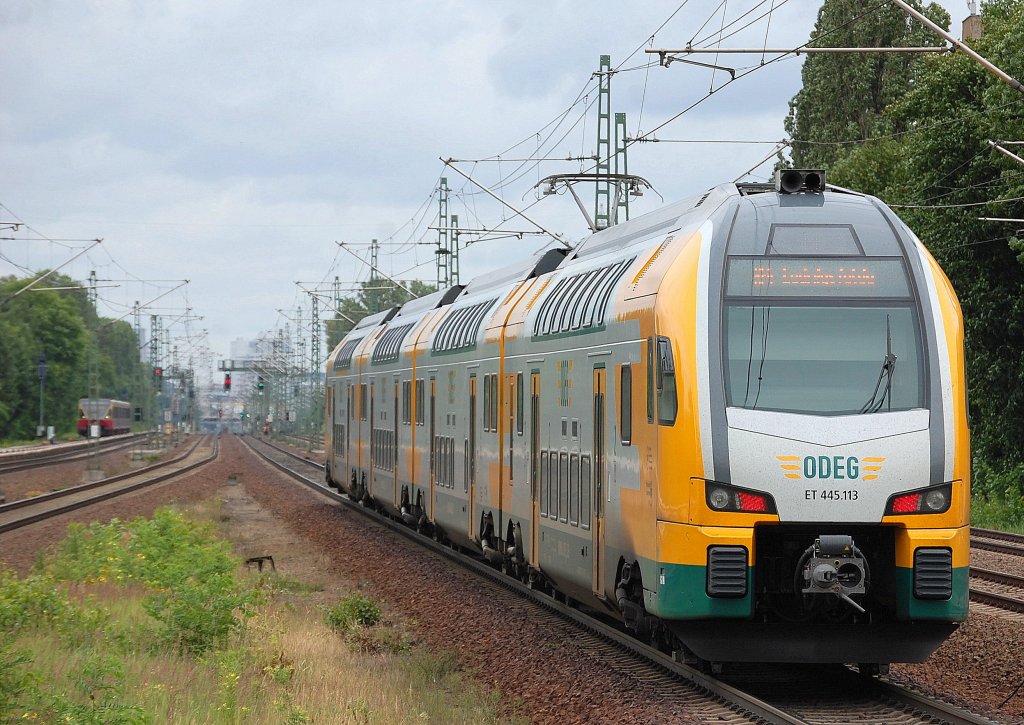 ODEG-KISS ET 445.113 als RE4 nach Ludwigsfelde am 26.06.13 Ausfahrt Bhf. Berlin-Jungfernheide Richtung Berlin Hbf. (tief).