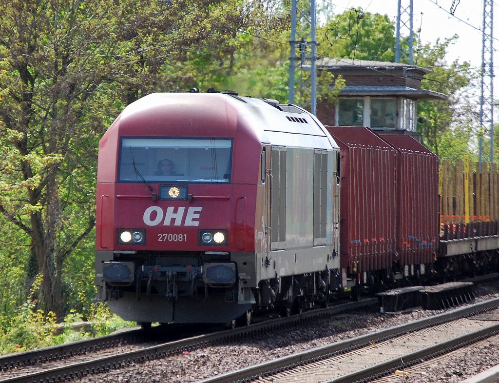 OHE 270081 (92 80 1223 102-5 D-OHE, Bj.2007) mit einem Leerzug Drehgestellflachwagen f�r Holztranspote Richtung Bernau, 05.05.10 Berlin-Karow. 