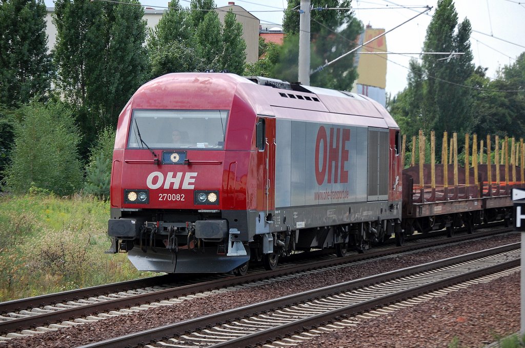 OHE 270082 (92 80 1223 103-3 D-OHE, Siemens, Bj.2007) mit einem Leerzug Drehgestellflachwageneinheiten f�r den Holztransport Richtung Berlin-Blankenburg, 10.08.10 Berlin-Pankow.