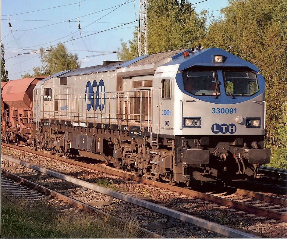 OHE Blue Tiger 330091 (92 80 1250 009-8 D-OHE) mit Ganzzug Sch�ttgutwagen am 09.05.08 Berlin-Karow.