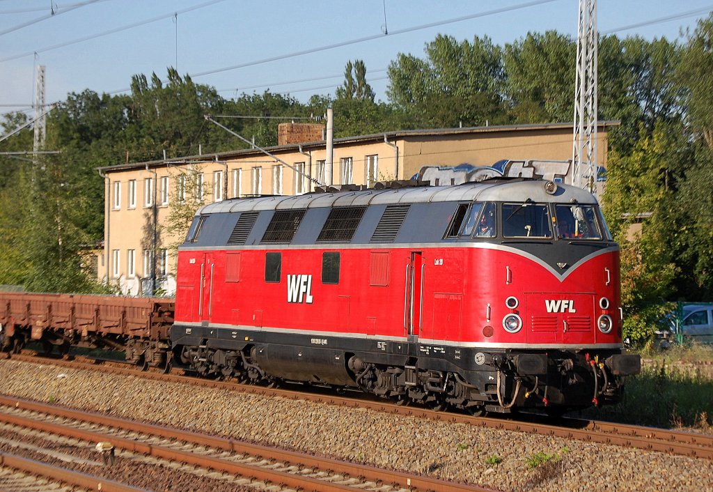 WFL Lok 20 (92 80 1228 501-3 D-WFL) mit Schotterzug am 24.07.12 Berlin-Blankenburg.