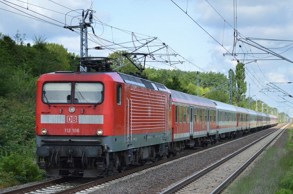 112 106 mit der diesjährigen Wagengarnitur für die Kreuzfahrersonderfahrten ab/an Warnemünde/Berlin am 15.07.15 Berlin-Hohenschönhausen.