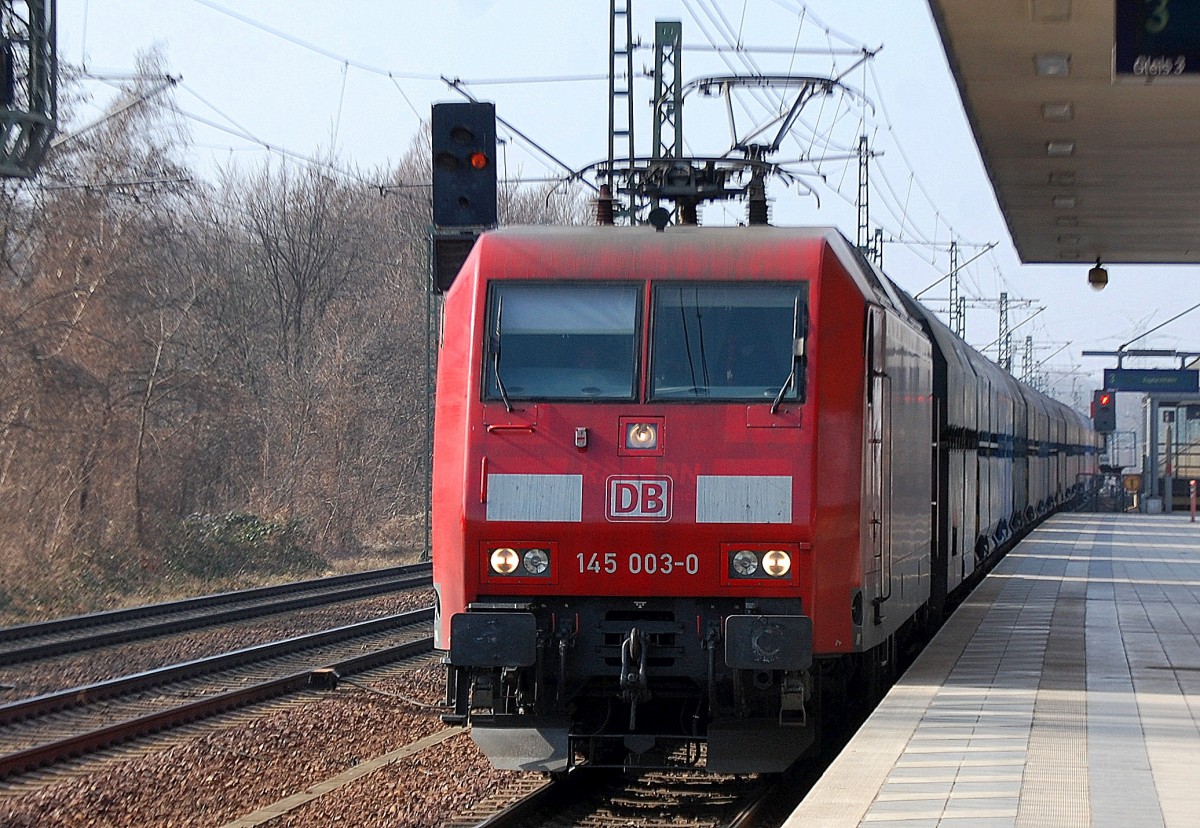 145 003-0 mit polnischen Schüttgutwagen Durchfahrt Bhf. Berlin-Jungfernheide am 03.03.14 Richtung Nordosten.