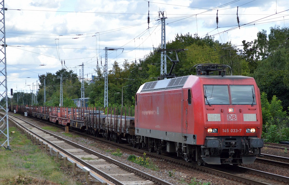 145 033-7 mit einem Transportzug Stahlbrammen am 07.09.15 Berlin-Hirschgarten