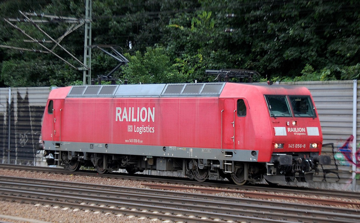 145 056-8 hat einen Sch�tgutzug mit polnischer Kohle in Spandau abgestellt und f�hrt Richtung Bhf. Berlin-Spandau davon, 19.08.13 H�he Berlin-Stresow.
