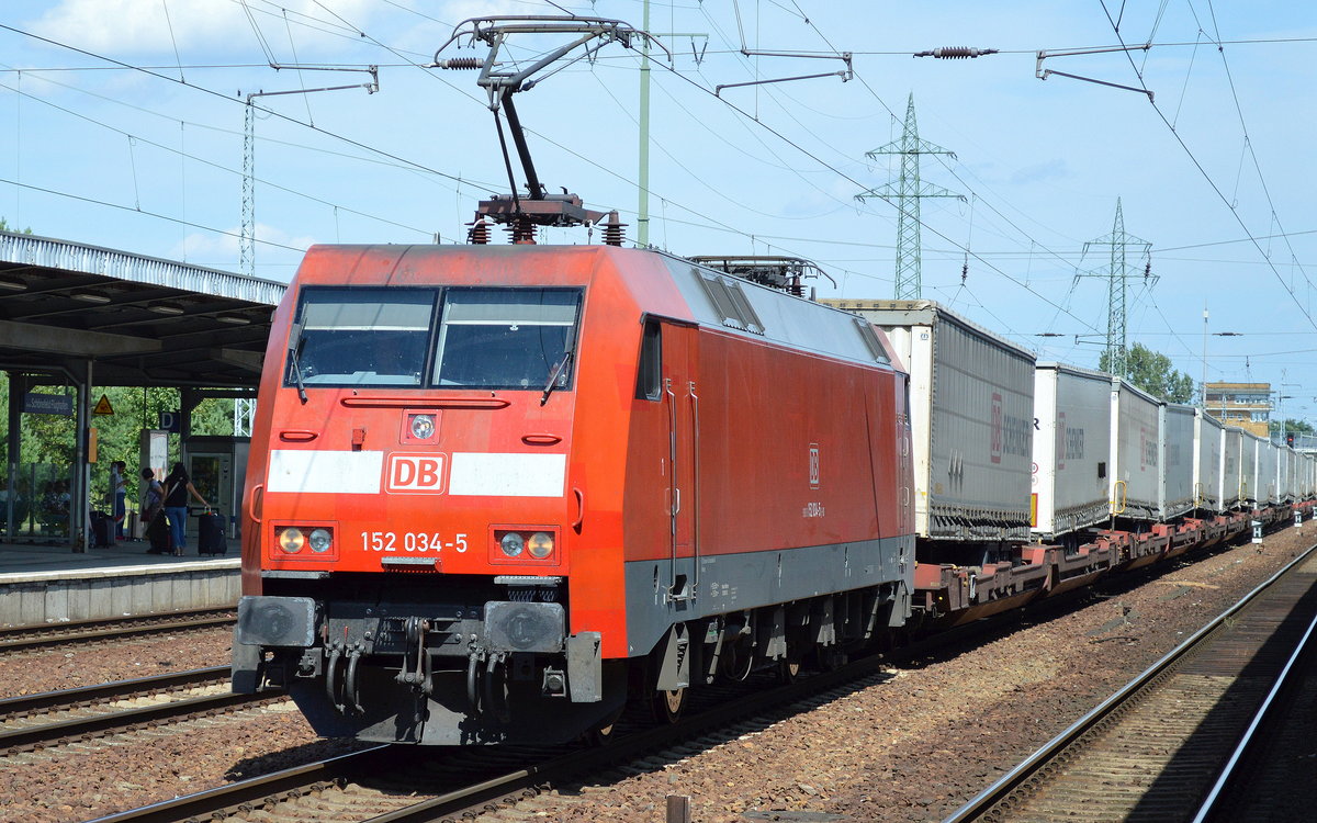 152 034-5 mit KLV-ZUg (DB SCHENKER Trailer) am 30.07.17 BF. Flughafen Berlin-Schönefeld.