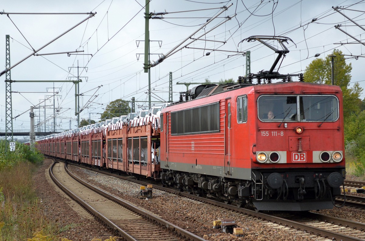 155 111-8 mit PKW-Transportzug mit fabrikneuen Toyoyta (hauptsächlich Toyota Auris) beladen am 11.09.14 Durchfahrt Bhf. Flughafen Berlin-Schönefeld.