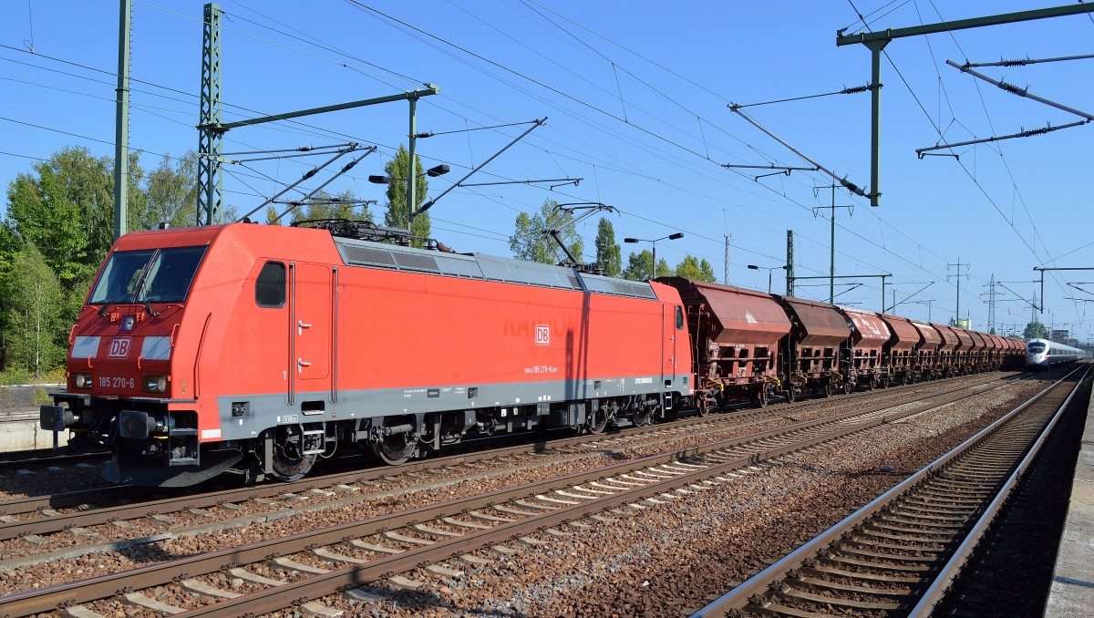 185 270-6 mit einem Ganzzug gedeckter Schüttgutwagen am 10.09.15 Bhf. Flughafen Berlin-Schönefeld.