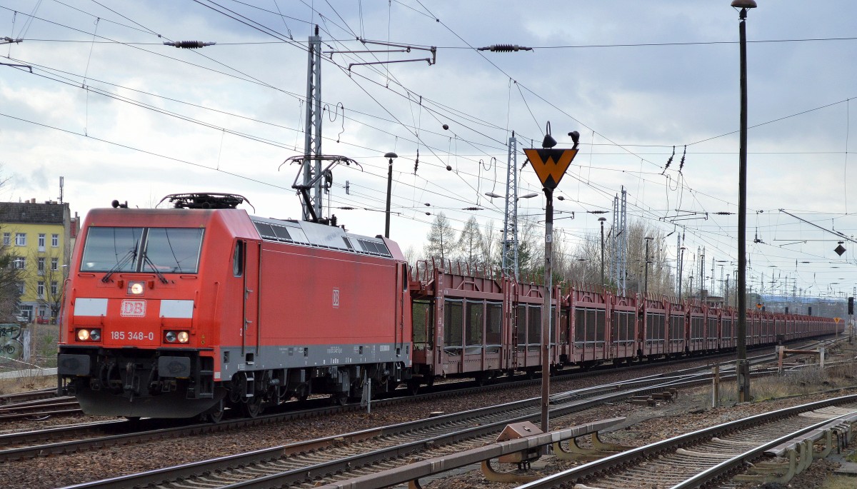 185 348-0 mit PKW-Transportwagen (leer) am 23.02.16 Berlin-Hirschgarten.
