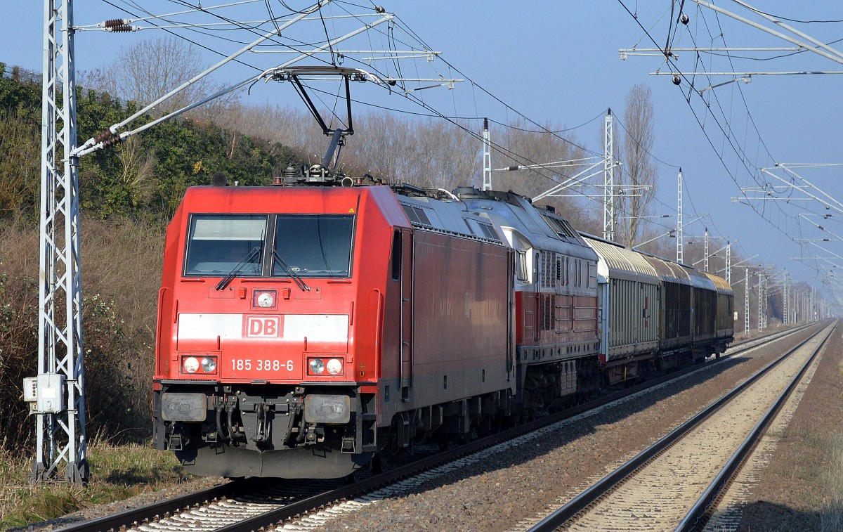 185 388-6 mit EWR 232 401-0 und einigen Güterwagen am Haken Richtung Berlin Marzahn am 17.02.15 Berlin-Hohenschönhausen.