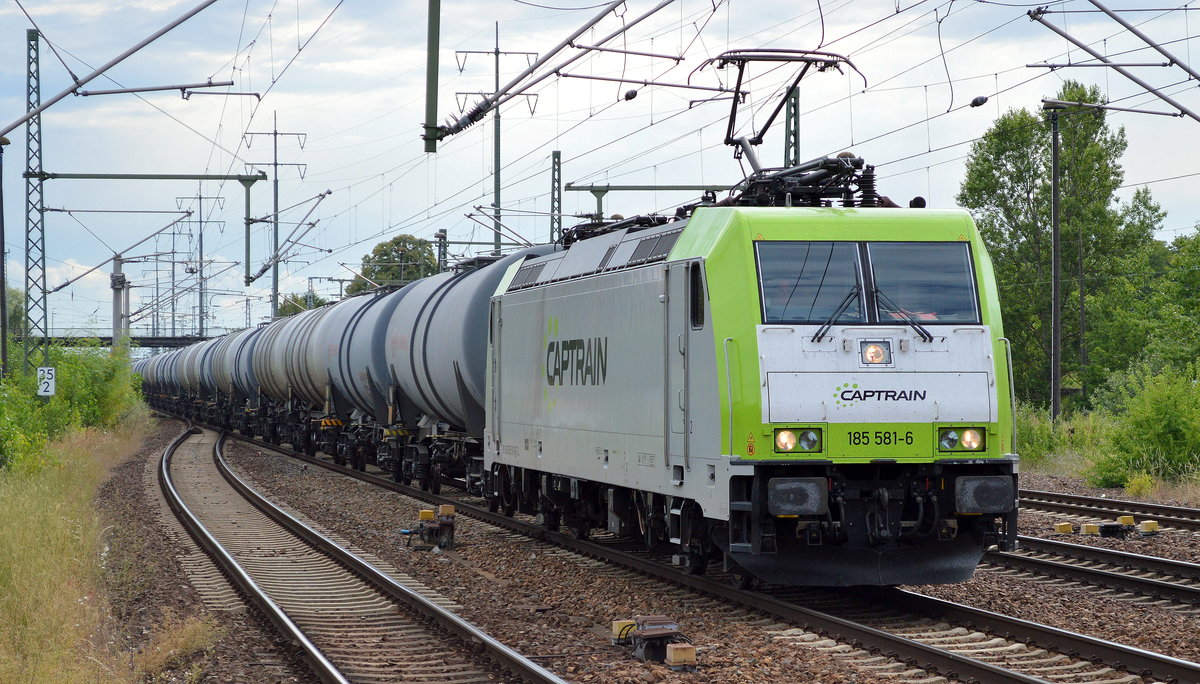 Captrain/ITL 185 581-6 mit Kesselwagenzug am 13.07.16 Bf. Flughafen Berlin-Schönefeld.
