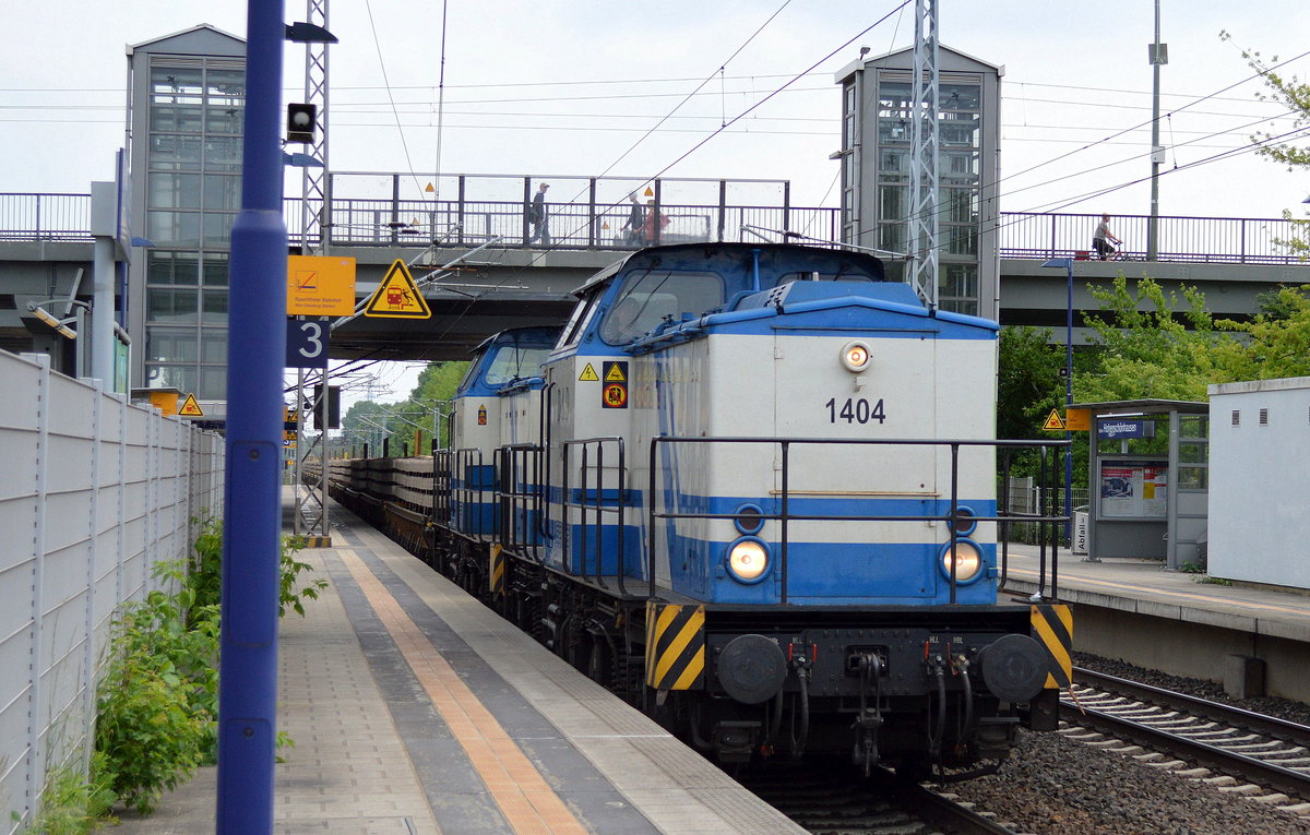 D & D mit der Doppeltraktion 1404/203 221-7 + 1402/203 208-4 und einem ganzzug Oberbaustoffwagen mit Fertiggleisbohlen am 27.05.16 Berlin-Hohenschönhausen.