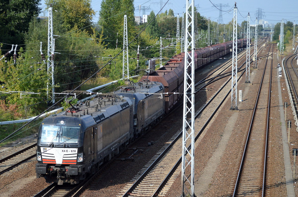 DB Cargo mit der MRCE Doppeltraktion X4 E 610 + X4 E - 607 und einem leerem Erzzug am 23.09.16 Berlin-Springpfuhl.