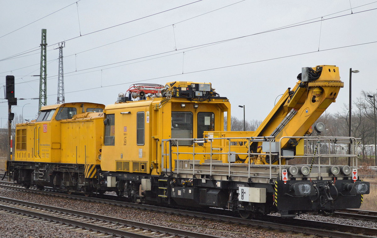 DB Netz Instandhaltung mit 203 310-8 mit IFO 703 101-6 am Haken am 29.03.17 Bf. Flughafen Berlin-Schönefeld.