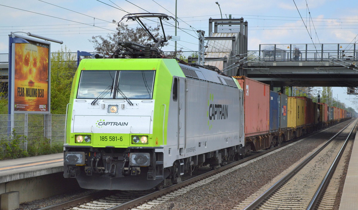 Die nächste in Captrain-Farben, die ITL 185 581-6 mit Containerzug am 03.05.16 Berlin-Hohenschönhausen.
