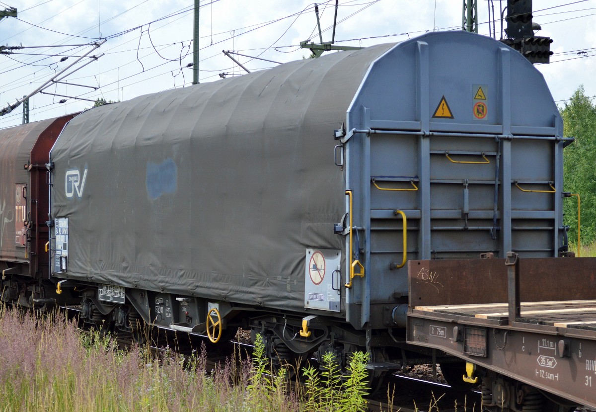 Drehgestell-Flachwagen mit Schiebeplane f�r den Coiltransport vom Wageneinsteller On Rail eingestellt in den Niederlanden mit der Nr. 33TEN-RIV 84 NL-ORWU 4675 012-1 Shimmns BH.Winterswick am 26.06.14 BHf. Flughafen Berlin-Sch�nefeld.