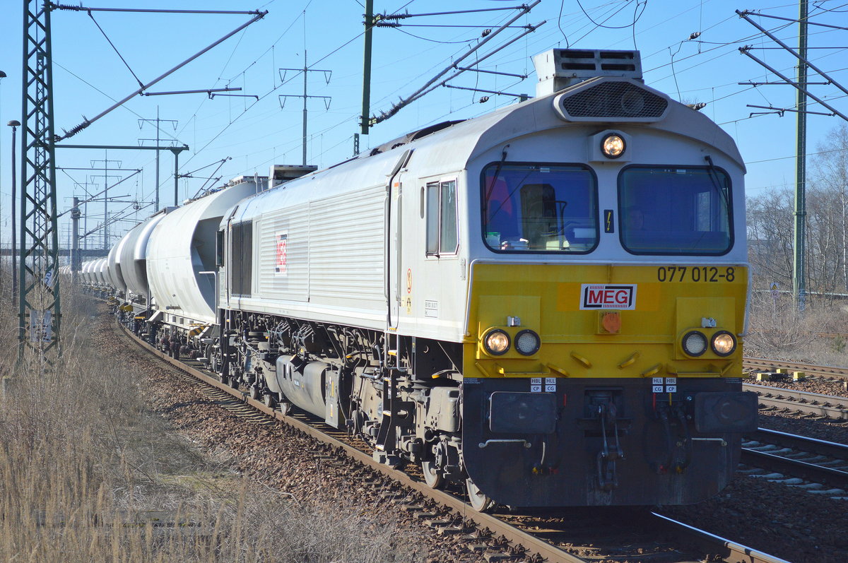 ECR 077 012-8 für die MEG mit Zementstaubzug (leer) Richtung Rüdersdorf am 15.02.17 Bf. Flughafen Berlin-Schönefeld.    