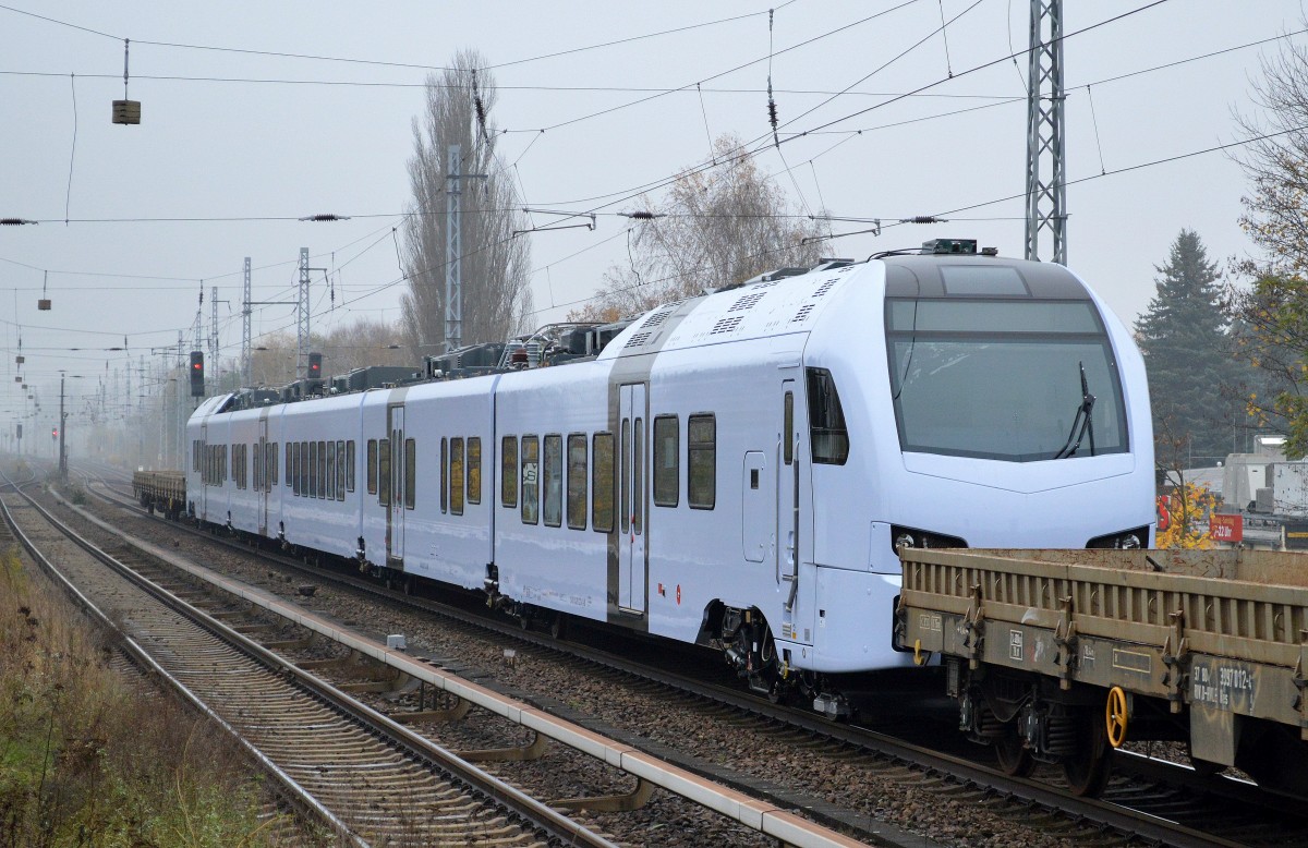 Einer nach dem anderen werden im Moment aausgeliefert, die neuen FLIRT für die DB REGIO Region Südwest Trier,diesmal war der Triebzug 429 622-4 dran der von hvle V160.9 am 12.11.14 überführt wurde, Berlin-Karow. 