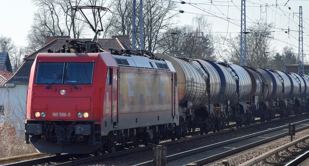 HGK/RHC 185 586-5 mit Kesselwagenzug am 23.03.15 Berlin-Karow.