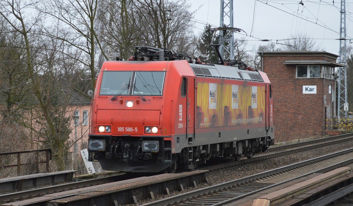 HGK/RHC 185 586-5 Richtung Schwedt am 10.02.15 Berlin-Karow.