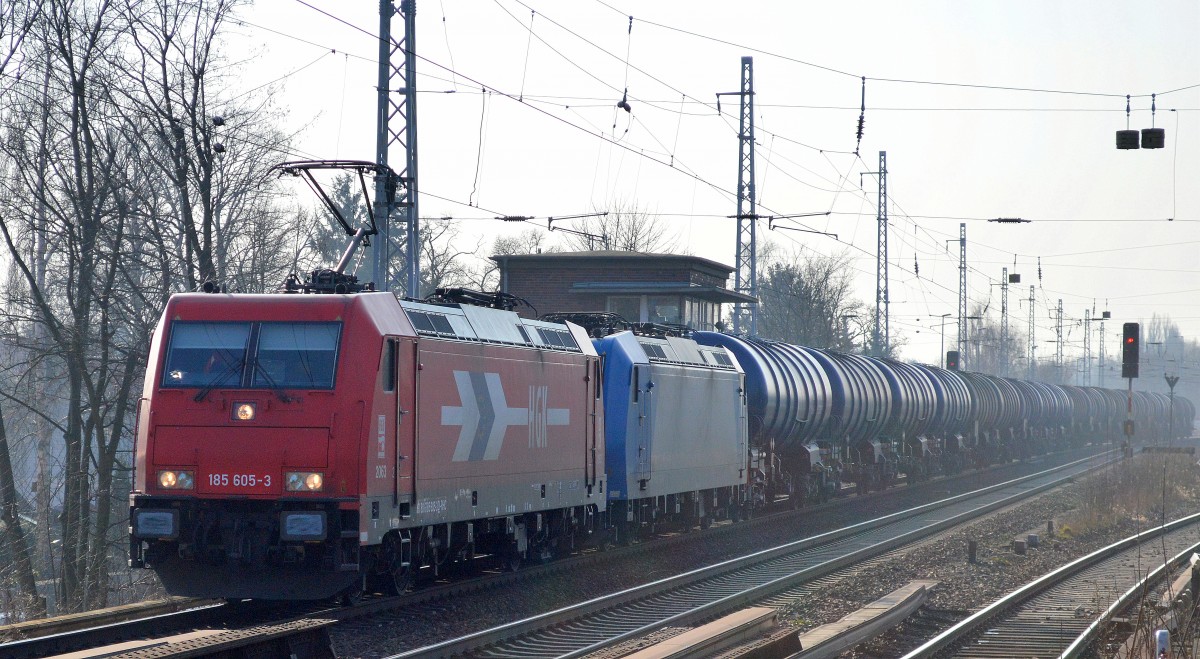 HGK/RHC 185 605-3 mit 185 523-8 und Kesselwagenzug (leer) am haken Richtung Schwedt am 17.02.15 Berlin-Karow.