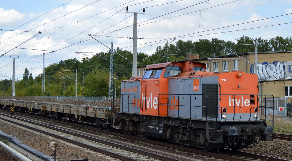 hvle V160.5 (203 143-3) mit Schotterzug Richtung Berliner Innenstadt am 25.08.14 Berlin-Blankenburg.