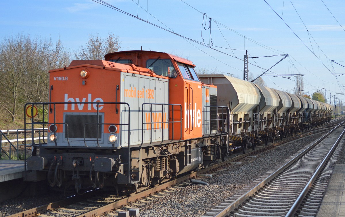 hvle V160.6 (203 144-1) mit Schotterzug am 27.10.14 Berlin-Hohenschönhausen. 