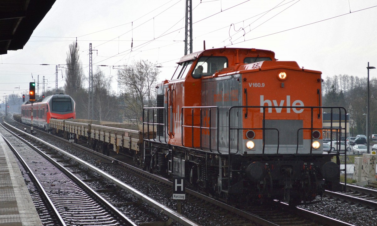 hvle V160.9 (203 141-7) bei der Überführungsfahrt eines fabrikneuen vierteiligen STADLER-FLIRT für die DB Regio ab Stadler Werk Berlin-Pankow über Berlin Karow am 24.03.14