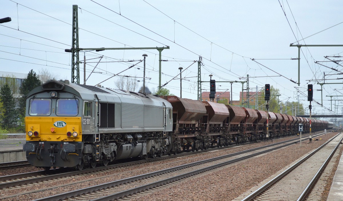 ITL CB 1001 (266 106-4) mit dem täglichen Schüttgutwagenzug am 11.04.14 Durchfahrt Bhf. Flughafen Berlin-Schönefeld. 