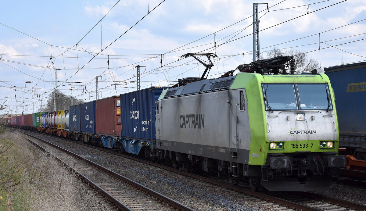  ITL - Eisenbahngesellschaft mbH, Dresden [D] mit ihrer  185 533-7  [NVR-Nummer: 91 80 6185 533-7 D-ITL] und einem Containerzug am 14.04.25 Höhe Bahnhof Saarmund.