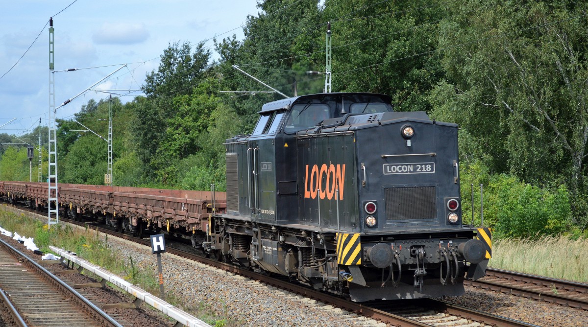 LOCON 218 (203 124-3) mit Ganzzug leerer Drehgestell-Flachwagen Richtung Innenstadt am 11.08.14 Mühlenbeck/Mönchmühle b.Berlin.