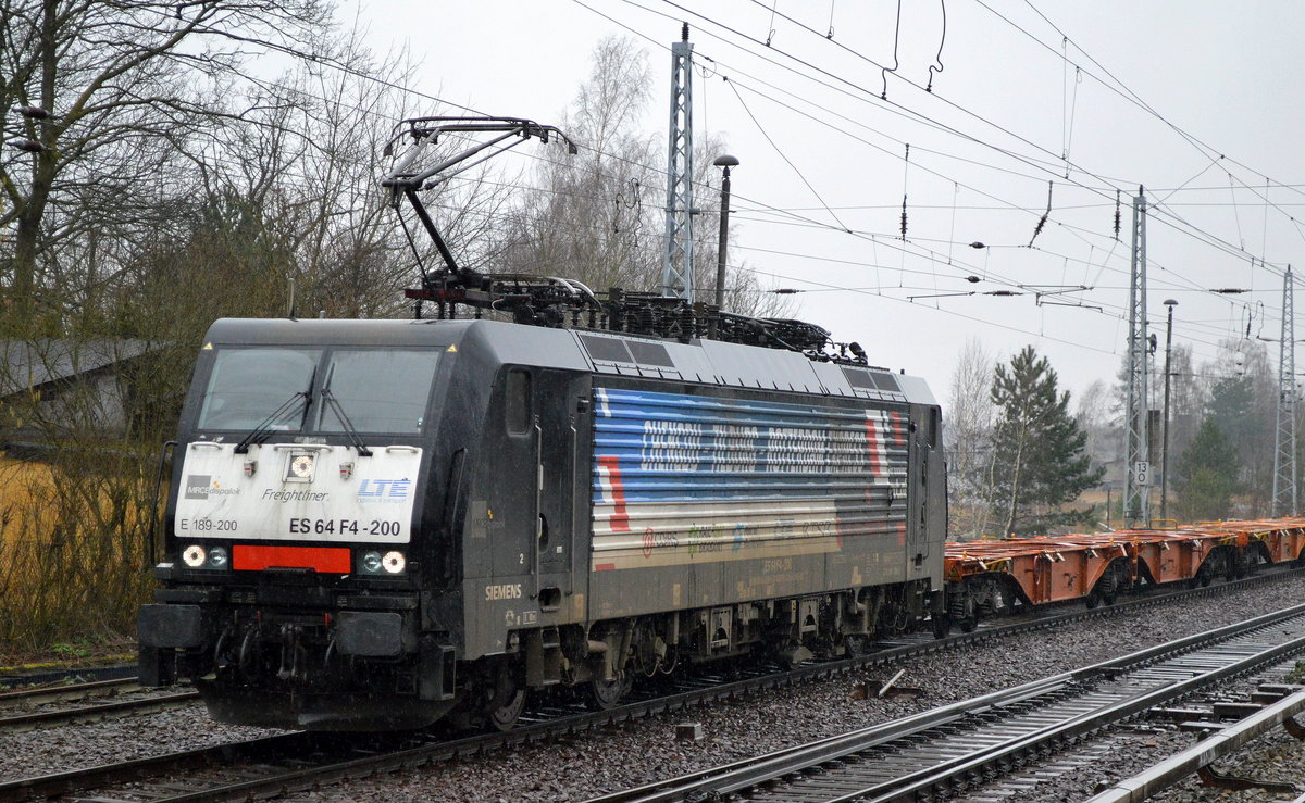 LTE Netherlands B.V. mit der MRCE Dispo   ES 64 F4-200  [NVR-Number: 91 80 6189 200-9 D-DISPO] und halb vollem Containerzug Richtung Polen am 31.01.18 Berlin-Hirschgarten.