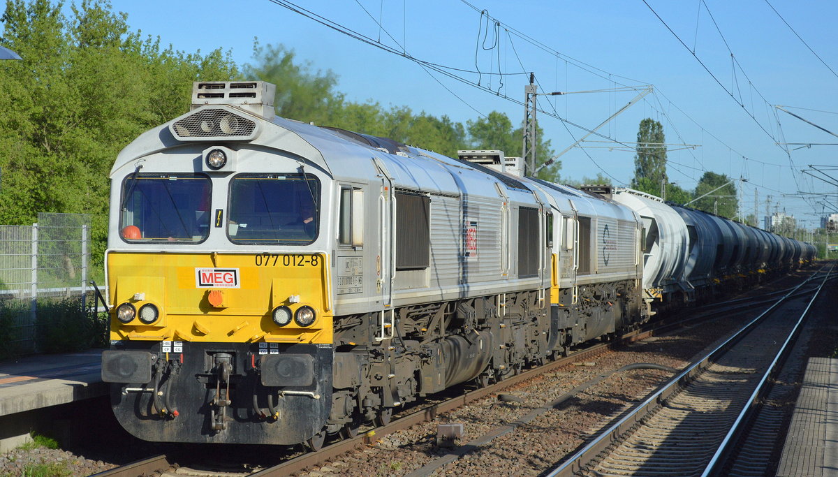 MEG mit der ECR Doppeltraktion 077 012-8 + 077 023-5 (F-MEG) und Zementstaubzug Richtung Rostock am 01.06.17 Bf. Berlin-Hohenschönhausen.