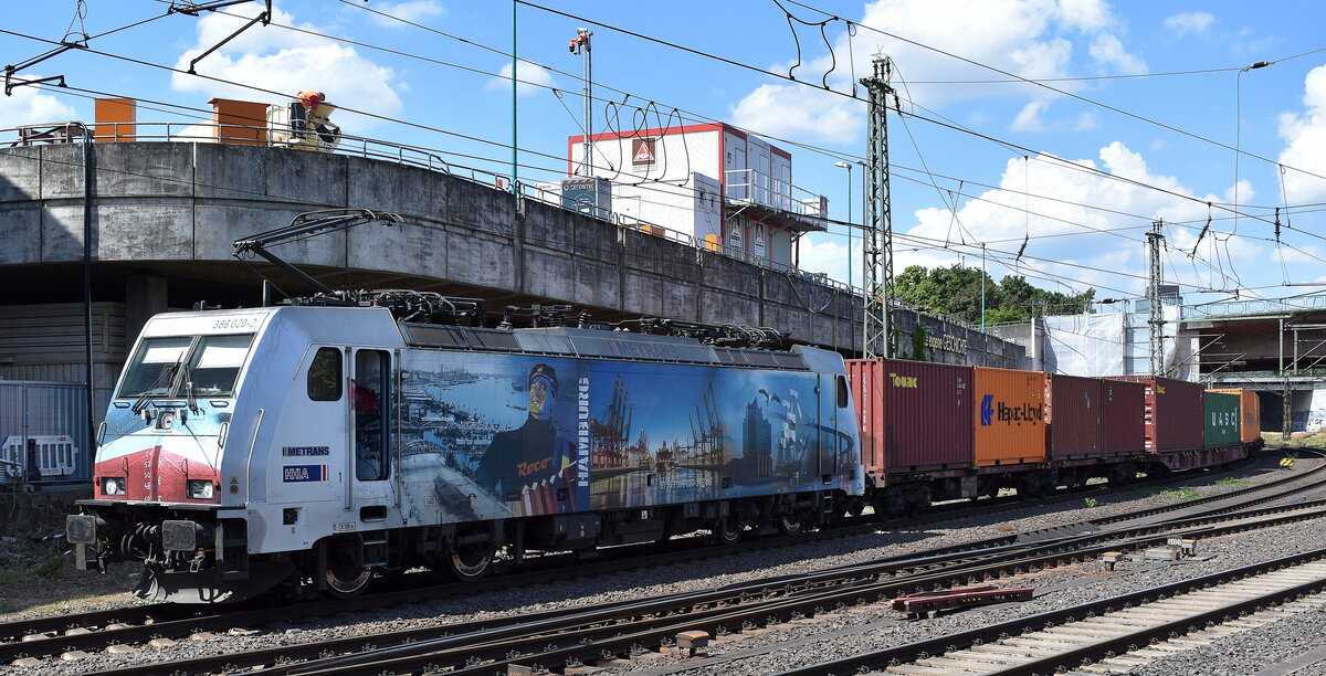 METRANS Rail s.r.o., Praha [CZ]  mit ihrer  386 020-2  [NVR-Nummer: 91 54 7386 020-2 CZ-MT] verlässt mit einem Containerzug den Hamburger Hafen am 20.05.25 Höhe Bahnhof Hamburg-Harburg.