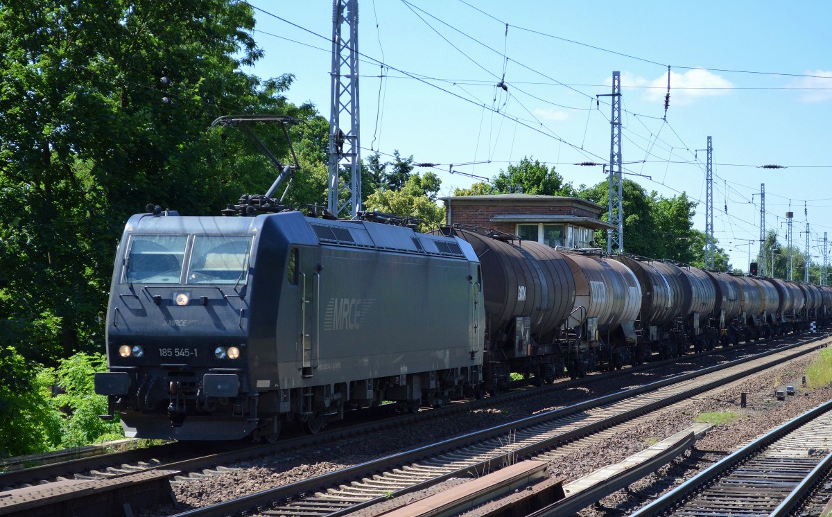 MRCE Lok 185 545-1 für die CTL mit Heizoelkesselzug Richtung Schwedt am 12.06.14 Berlin-Karow.