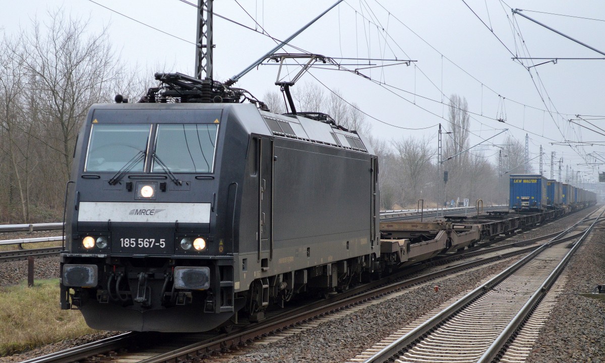 MRCE Mietlok von BoxXpress 185 567-5 mit KLV-Zug (LKW-WALTER) Richtung karower Kreuz Berlin am 21.01.15 Berlin-Hohenschönhausen. 