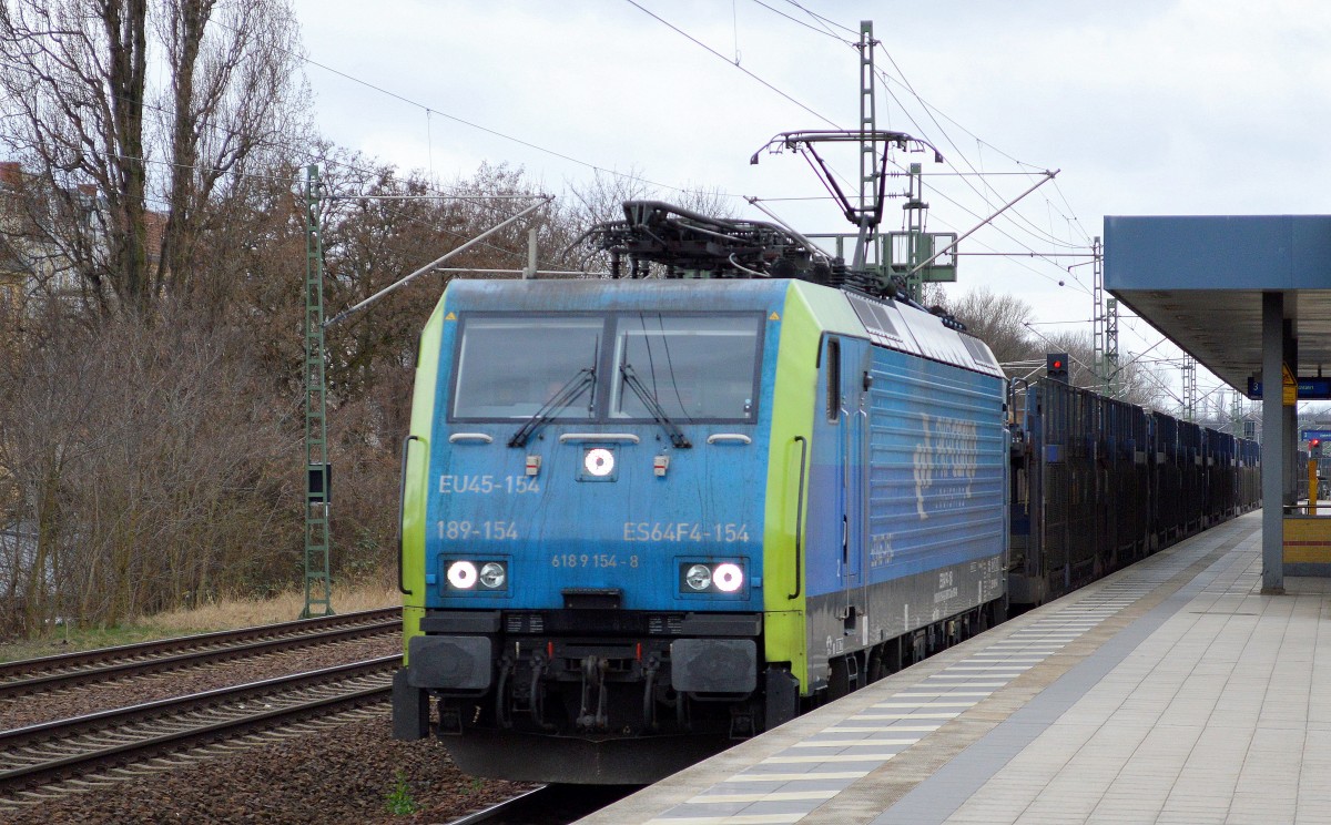PKP Cargo mit MRCE Dispolok 189-154/EU45-154 und Leerzug französsicher PKW-Transportwagen (TOUAX) bei der Durchfahrt Bhf. Berlin-Jungfernheide am 29.03.15