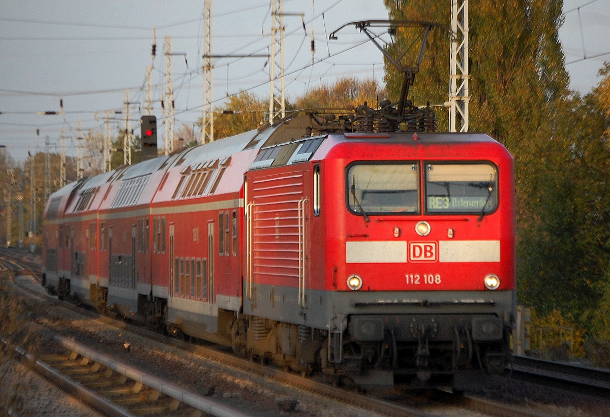 RE3 nach Elsterwerda mit 112 108, 22.10.13 Berlin-Karow.