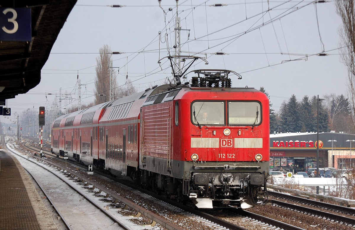 RE3 nach Elsterwerda mit 112 122 am 31.01.14 Berlin-Karow.