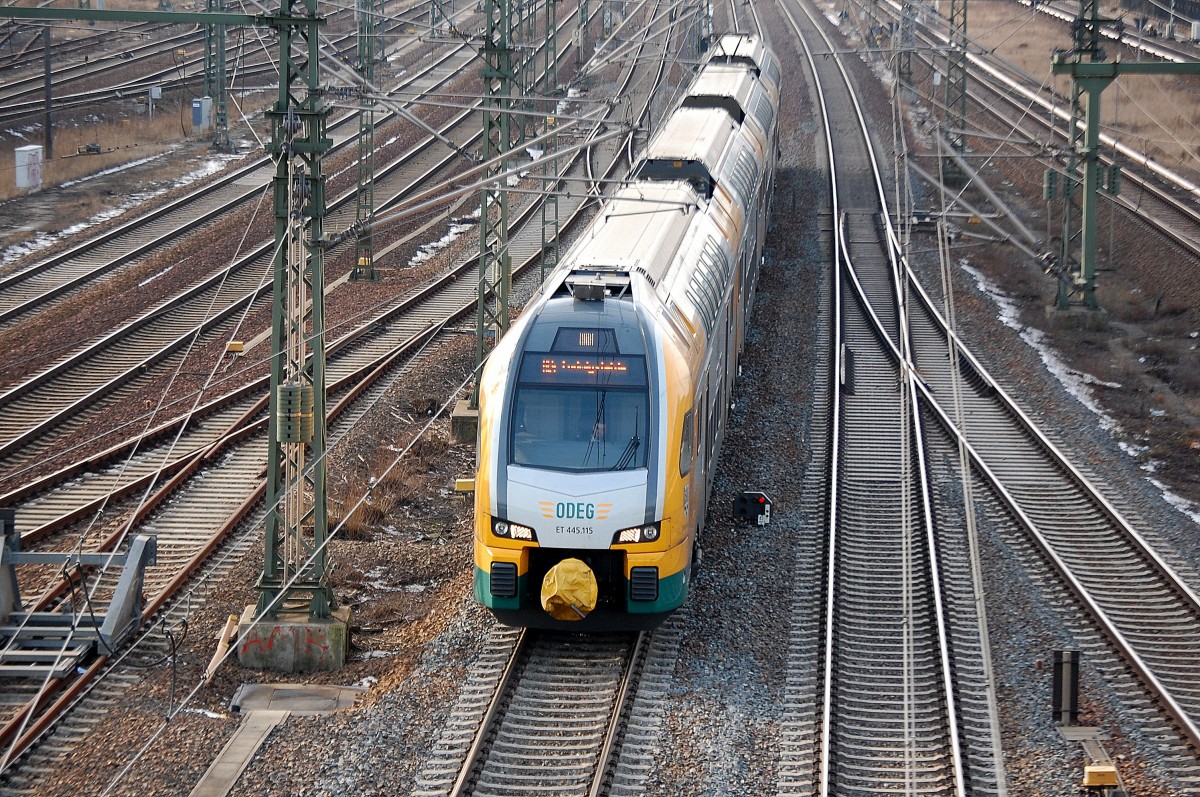 RE4 nach Ludwigsfelde mit ODEG-KISS ET 445.115 Richtung Berlin Hbf. (tief) am 03.02.14 Berlin-Putlitzbrücke.