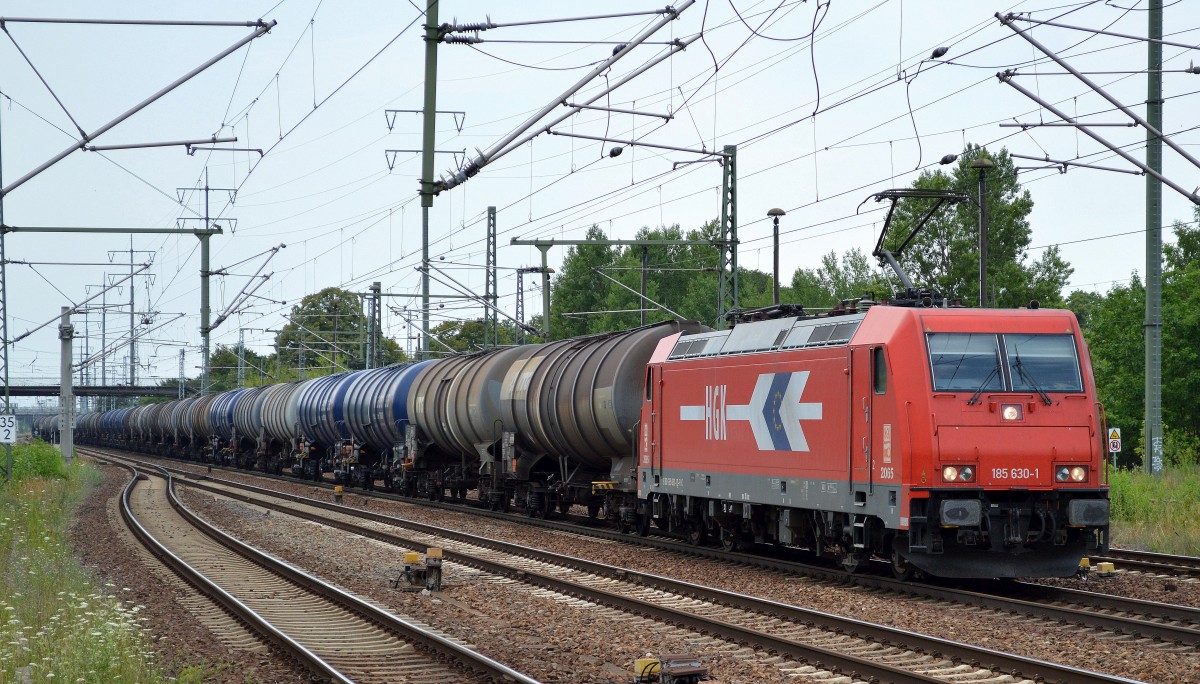 RHC 185 630-1 mit einem Kesselwagenzug (leer) Richtung Stendell am 18.07.15 Bhf. Flughafen Berlin-Schönefeld.