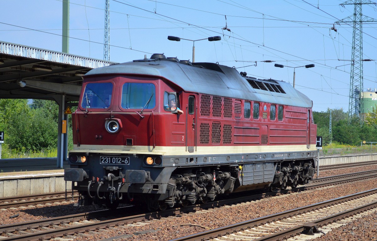 WFL mit ihrer 231 012-6 bei der Durchfahrt Bhf. Flughafen Berlin-Schönefeld.