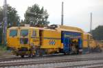 GBW Universalstopfmaschine P&T UNIMAT 09-475/4S beim Gleisneubau H�he Berlin Adlershof aus dem S-Bahnfenster heraus abgelichtet am 05.08.10 