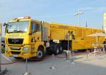 Die neuste Zweiwegevariante als LKW mit MAN Zugmaschine MAN TGS 26.480 und Schienenfr�seauflieger mit der Bezeichnung SF02-FS-Truck der Fa. LINSINGER aus �sterreich, 24.09.10 InnoTrans 2010