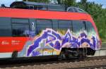 Graffiti an einem TALENT 2 der DB am 12.08.14 Bhf.