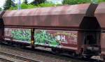 Graffiti am 19.06.15 auf einem Schüttgutwagen gesichtet Berlin-Hirschgarten.