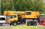 Ein SCANIA 400 LIEBHERR Teleskop-Aufbaukran Typ LTF 1035-3.1 am 19.08.13 Berlin-Marzahn.