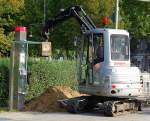 Ein KUBOTA KX61-3 Minibagger (TRAMANN+SOHN) f�r die Berliner Wasserbetriebe im Einsatz, 21.08.12 Berlin-Pankow.